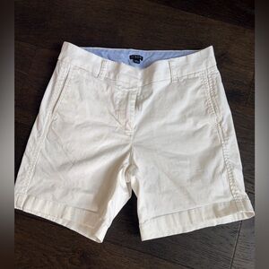 J. Crew Women's white 7-inch inseam chino shorts.